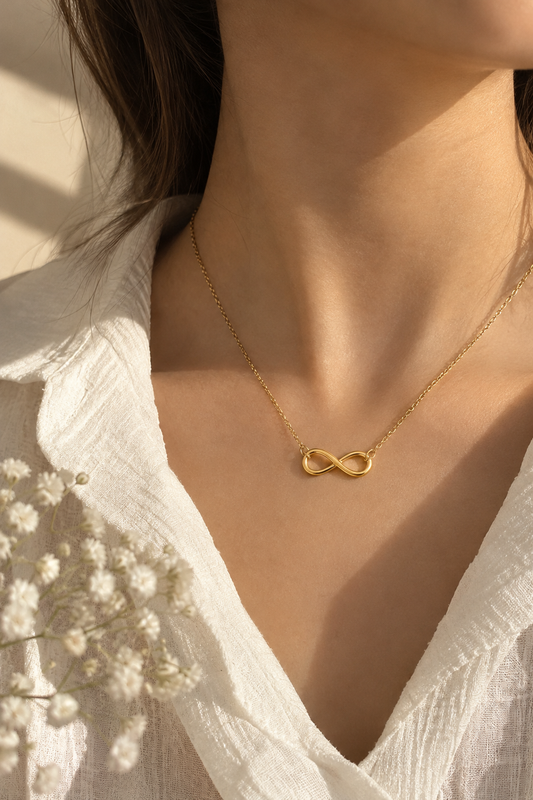 Infinity Glow – Gold-Tone Infinity Necklace | ZEVREL